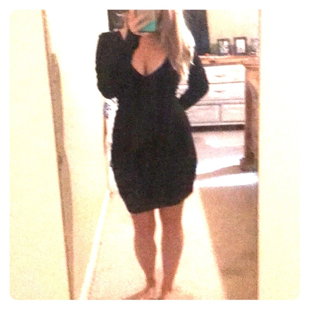Gorgeous black sweater dress with plunging neck